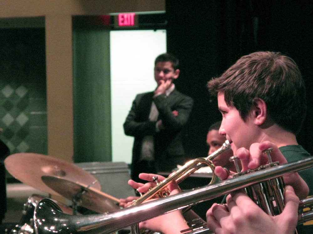 Eldar (background) observes jazz band practice at Kenmore Middle School in Arlington, Va.