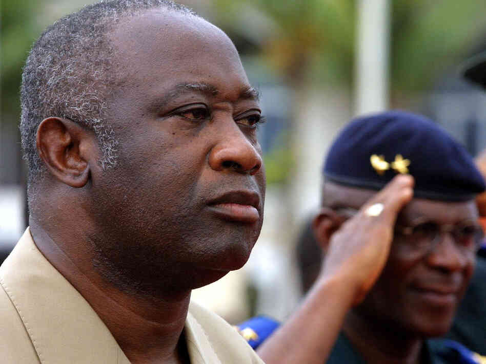 Then-President President Laurent Gbagbo of Ivory Coast and his chief of staff, Gen. Mathias Doue, attend a welcoming ceremony for Malian President Alpha Oumar Konare on Dec., 29, 2000, in Abidjan. Then-President President Laurent Gbagbo of Ivory Coast and his chief of staff, Gen. Mathias Doue, attend a welcoming ceremony for Malian President Alpha Oumar Konare on Dec., 29, 2000, in Abidjan.