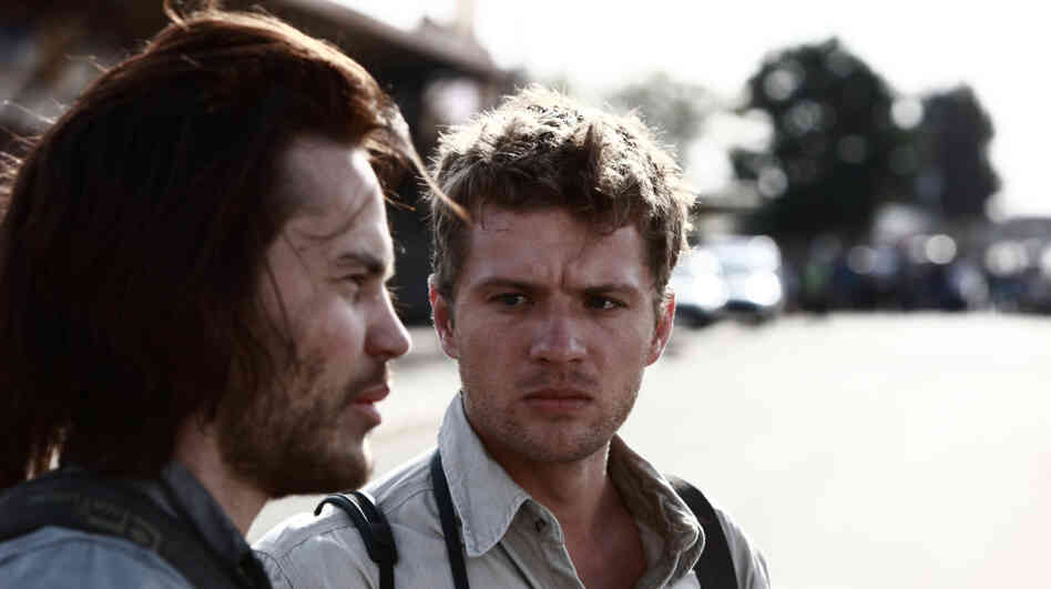 Triggermen: Greg Marinovich (Ryan Phillippe, right) and Kevin Carter (Taylor Kitsch) are two of the four combat photographers who made a name for themselves as the Bang Bang Club. Triggermen: Greg Marinovich (Ryan Phillippe, right) and Kevin Carter (Taylor Kitsch) are two of the four combat photographers who made a name for themselves as the Bang Bang Club.