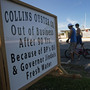Teens walk past a closed oyster business last week in Golden Meadow, La. A number of Louisiana fishermen have had to close because of economic conditions blamed on the Deepwater Horizon oil spill. Nearly a year after the spill, hundreds of lawsuits are slowly moving through the courts.