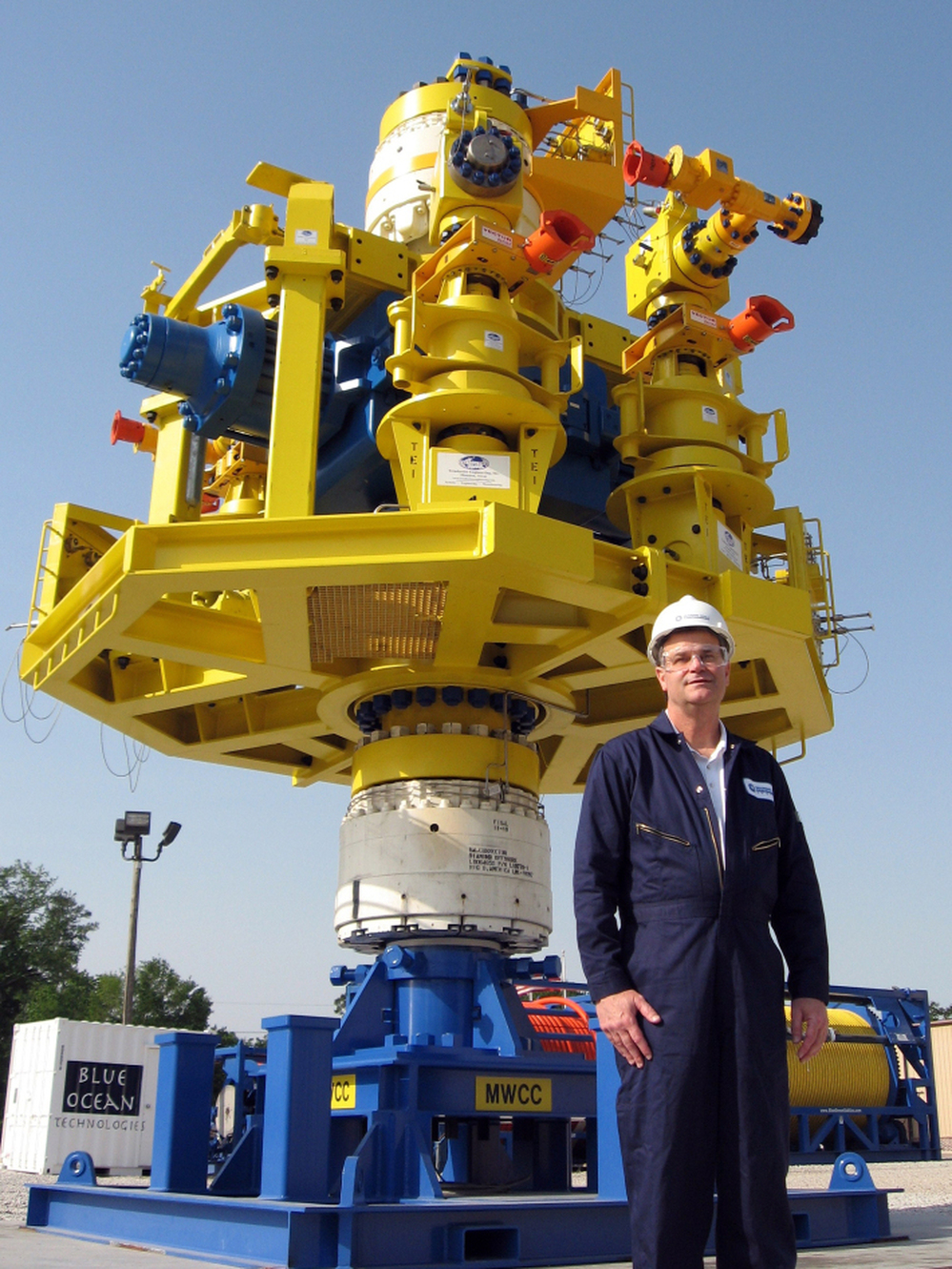 Dan Smallwood, chief operating officer for Marine Well Containment Co., stands in front of a capping stack that would be placed over an oil well to cap it off in an emergency.