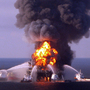 Fire boat response crews battle the blazing remnants of the BP-operated off-shore oil rig Deepwater Horizon in the Gulf of Mexico.