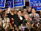 Then-gubernatorial candidate Tim Pawlenty and running mate Carol Molnau celebrate their victory at Republican election headquarters on Nov. 6, 2002, in Bloomington, Minn. The former governor says he was inspired by Ronald Reagan — someone who wasn't considered such a hero 30 years ago in Pawlenty's blue-collar neighborhood. Then-gubernatorial candidate Tim Pawlenty and running mate Carol Molnau celebrate their victory at Republican election headquarters on Nov. 6, 2002, in Bloomington, Minn. The former governor says he was inspired by Ronald Reagan — someone who wasn't considered such a hero 30 years ago in Pawlenty's blue-collar neighborhood.
