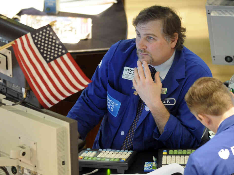 The Dow Jones Industrial Average fell sharply in New York trading after Standard & Poor's warned investors on U.S. government debt.