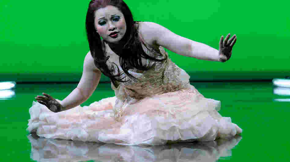 Soprano Ying Huang in the title role of Zhou Long's Pulitzer Prize-winning opera Madame White Snake. Soprano Ying Huang in the title role of Zhou Long's Pulitzer Prize-winning opera Madame White Snake.