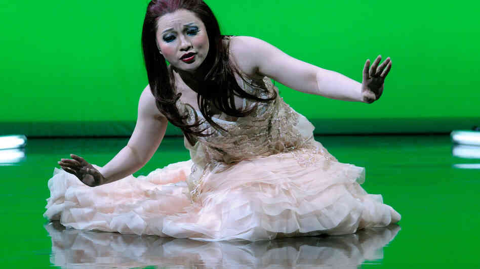 Soprano Ying Huang in the title role of Zhou Long's Pulitzer Prize-winning opera Madame White Snake. Soprano Ying Huang in the title role of Zhou Long's Pulitzer Prize-winning opera Madame White Snake.