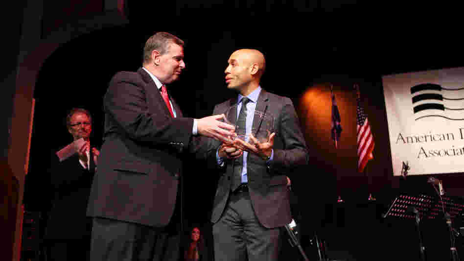 Indianapolis Mayor Greg Ballard presents Aaron Diehl with the 2011 Cole Porter Fellowship.