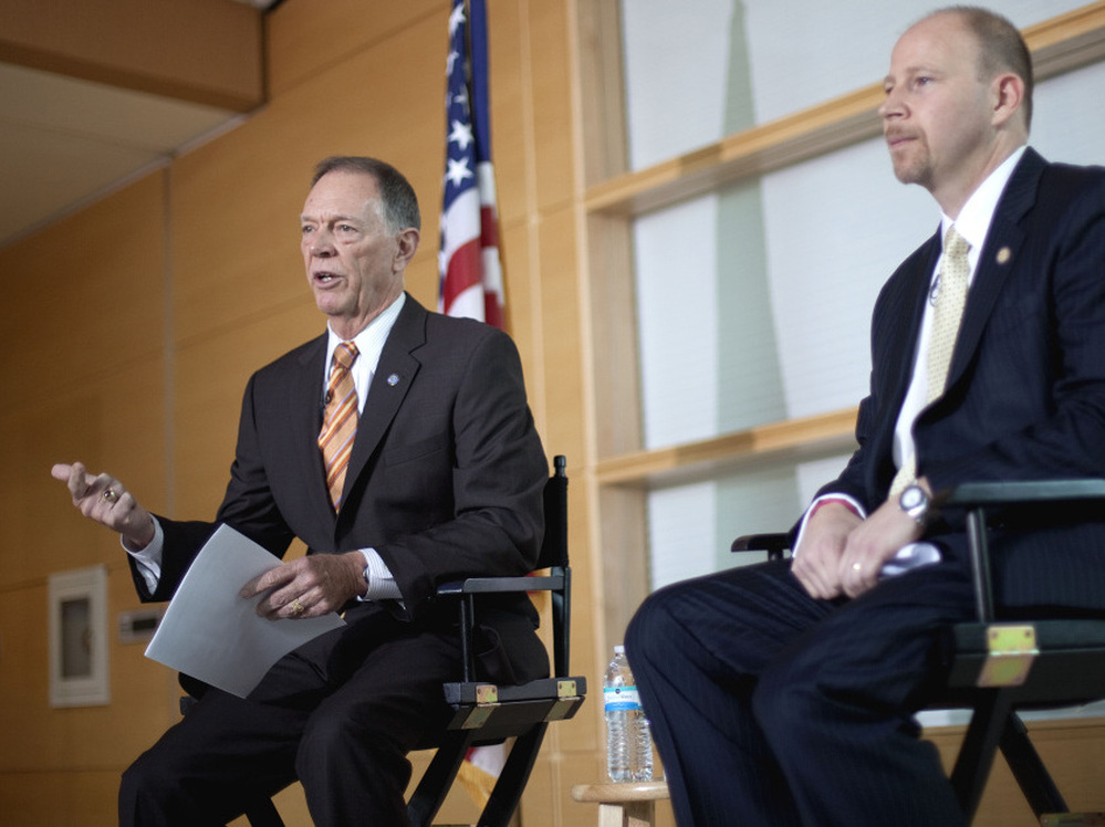 FAA Administrator Randy Babbitt (left) and National Air Traffic Controllers Association President Paul Rinaldi met with Atlanta-based air traffic controllers Monday to discuss new rules governing schedules in the hopes of reducing incidents of sleeping on the job.