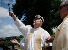 Monsignor Frederic Brunet blesses the boat the Maycie Brooke before climbing aboard the vessel to begin the boat blessing parade, in Chauvin, La. Monsignor Frederic Brunet blesses the boat the Maycie Brooke before climbing aboard the vessel to begin the boat blessing parade, in Chauvin, La.