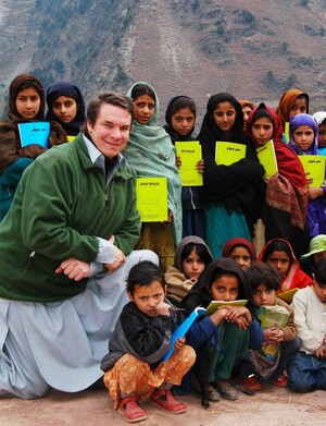 Greg Mortenson, the author of Three Cups of Tea and Stone Into Schools, poses with Nowseri schoolchildren in Azad Kashmir, Pakistan.