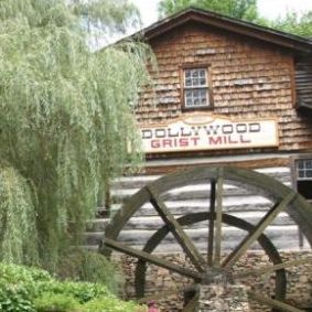 The train goes by the Grist Mill at Dollywood.