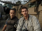 Award-winning photojournalist Tim Hetherington (right) known for his work in war zones, died Wednesday in the Libyan city of Misrata when he was hit by a mortar round. He is pictured here with Sebastian Junger, his co-director of the film Restrepo, which was nominated for the best-documentary Oscar this year. Award-winning photojournalist Tim Hetherington (right) known for his work in war zones, died Wednesday in the Libyan city of Misrata when he was hit by a mortar round. He is pictured here with Sebastian Junger, his co-director of the film Restrepo, which was nominated for the best-documentary Oscar this year.