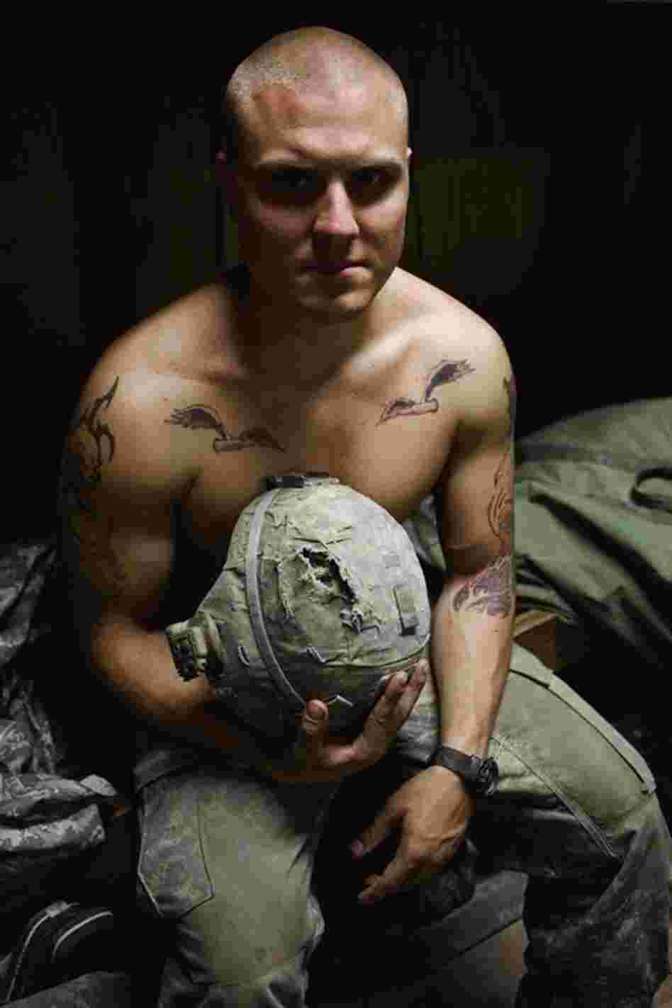 An image from Hetherington's book Infidel which was taken while he was embedded with writer Sebastian Junger in the Korengal Valley of Afghanistan in 2008.