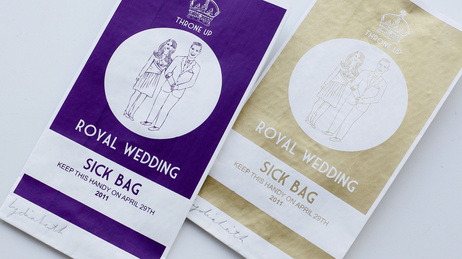 Two specially commissioned airline style sick bags for people who have had too much of the Royal Wedding are seen in a London gallery. Two specially commissioned airline style sick bags for people who have had too much of the Royal Wedding are seen in a London gallery.