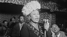 Ella Fitzgerald performs with the Dizzy Gillespie Big Band in 1947. That's Gillespie to her right, in complete awe. Ella Fitzgerald performs with the Dizzy Gillespie Big Band in 1947. That's Gillespie to her right, in complete awe.