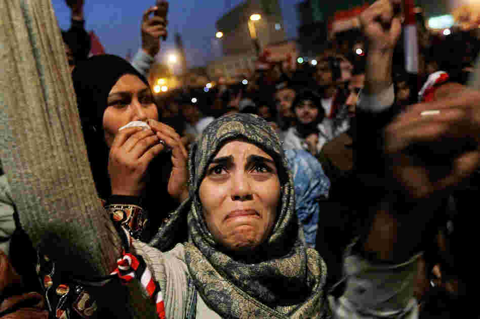 A woman in Tahrir Square cries after it was announced that Egyptian President Hosni Mubarak was giving up power, Feb. 11.