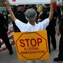 A demonstration against illegal immigration last July in Phoenix brought out hundreds of supporters of SB 1070.