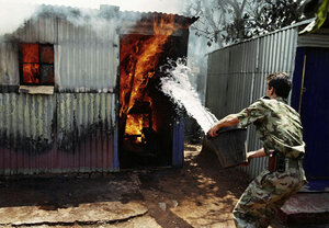 It was a South African magazine that coined Silva and Marinovich as "Bang-Bang" photographers. In 1994, Silva captured ongoing clashes between the Zulu Inkatha Freedom Party and African National Congress supporters.