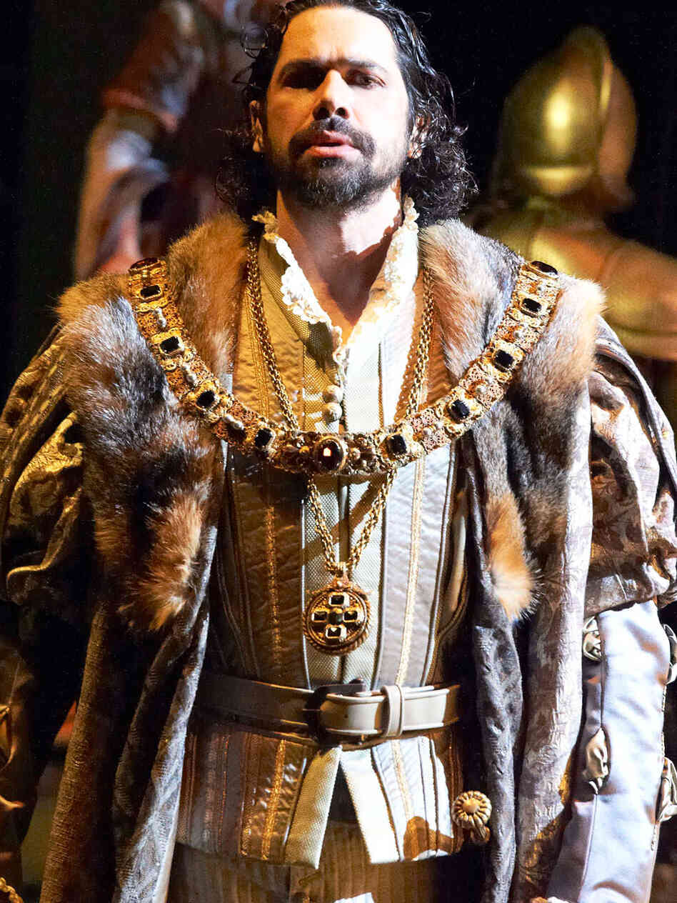 Henry VIII (Bass-baritone Ildebrando D'Arcangelo) distrusts his queen, Anne Boleyn, in Donizetti's historical opera, Anna Bolena. Henry VIII (Bass-baritone Ildebrando D'Arcangelo) distrusts his queen, Anne Boleyn, in Donizetti's historical opera, Anna Bolena.
