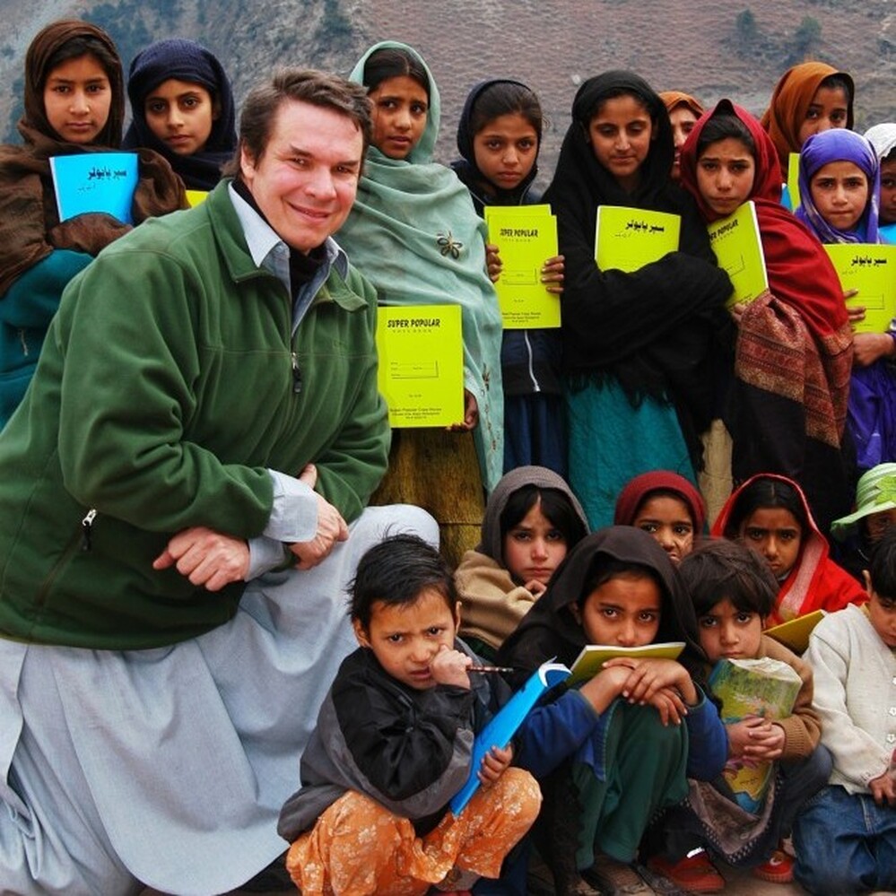 Greg Mortenson, author of Three Cups of Tea and Stone Into Schools, with schoolchildren in Azad Kashmir, Pakistan.