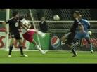 Agudelo (in white) sends the ball home. Agudelo (in white) sends the ball home.