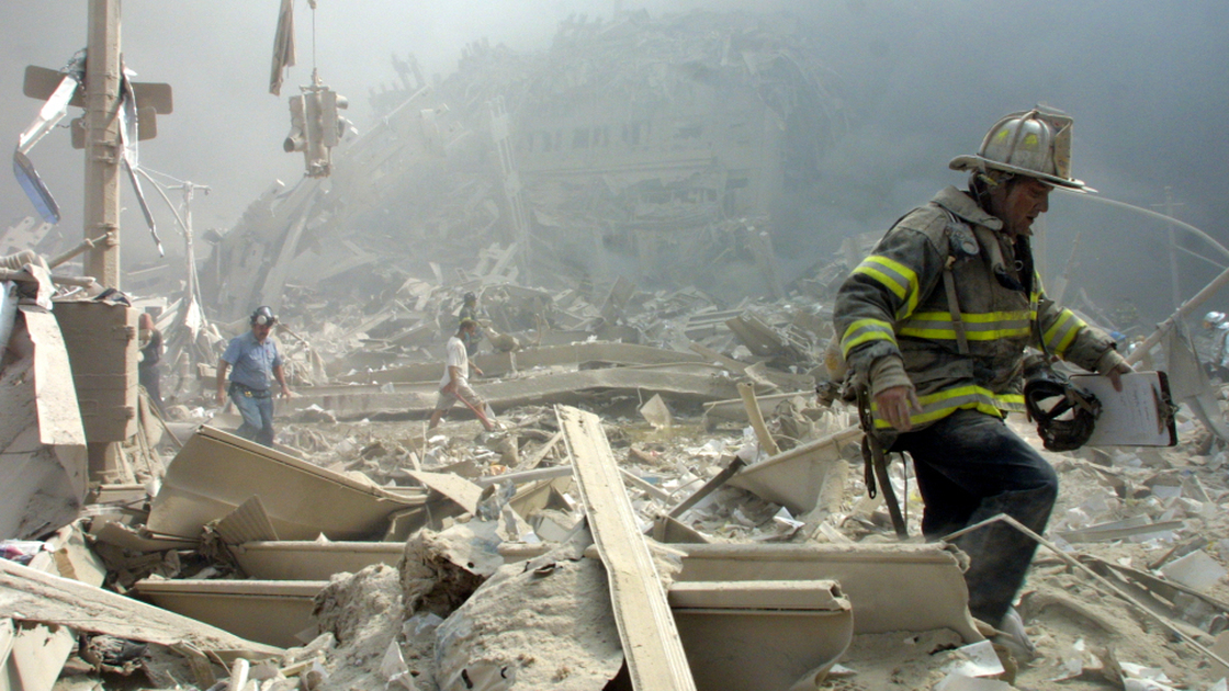 Sept. 11, 2001: A firefighter walks through the rubble at New York's World Trade Center.