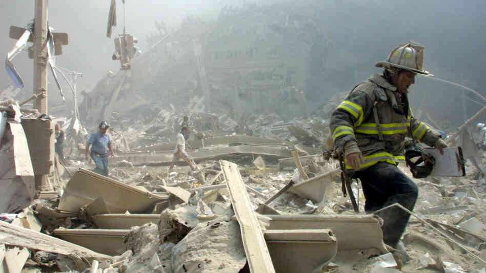 Sept. 11, 2001: A firefighter walks through the rubble at New York's World Trade Center.