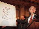 Then-House Speaker Newt Gingrich holds up a copy of the Republican Party's "Contract with America" during a rally to celebrate the first 50 days of the Republican majority in Congress in 1995. Then-House Speaker Newt Gingrich holds up a copy of the Republican Party's "Contract with America" during a rally to celebrate the first 50 days of the Republican majority in Congress in 1995.