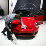 An auto detailer polishes the new 2012 Volkswagen Beetle on the floor of the New York International Auto Show. An auto detailer polishes the new 2012 Volkswagen Beetle on the floor of the New York International Auto Show.