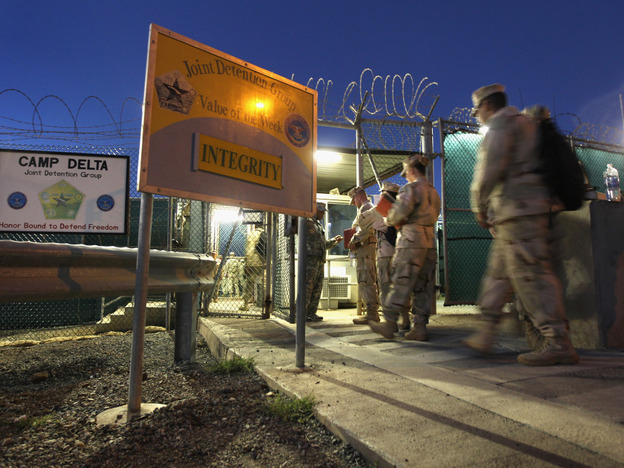U.S. military guards arrive for their sunrise shift at Camp Delta at the U.S. detention center in Guantanamo Bay, Cuba.