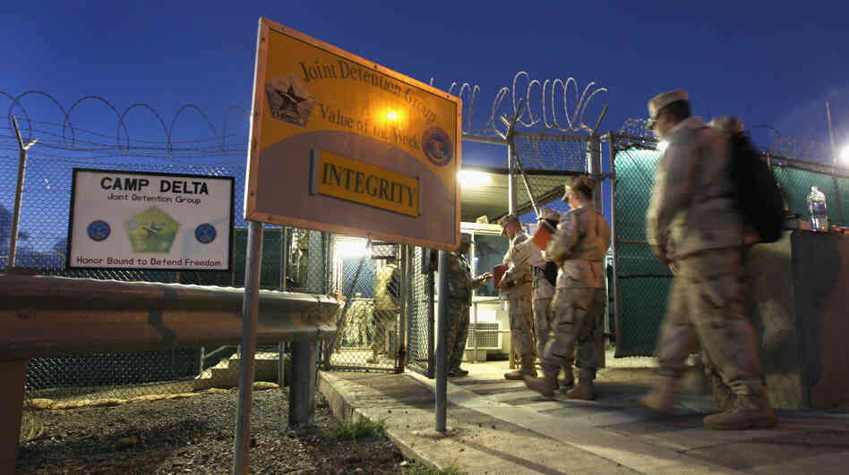 U.S. military guards arrive for their sunrise shift at Camp Delta at the U.S. detention center in Guantanamo Bay, Cuba.