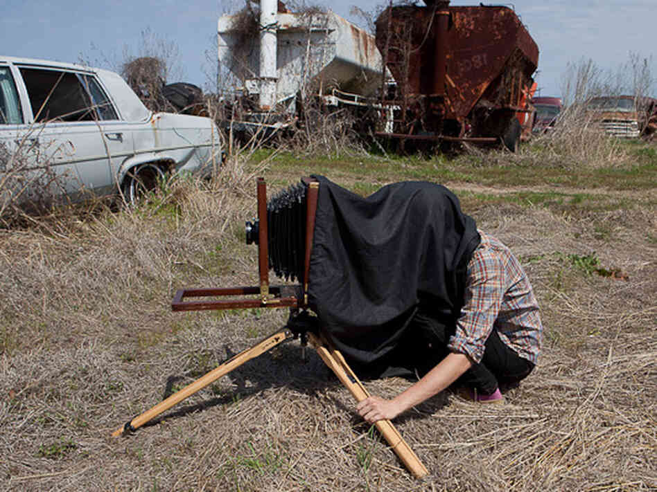 Hasty takes a photograph with her wet-plate camera Hasty takes a photograph with her wet-plate camera