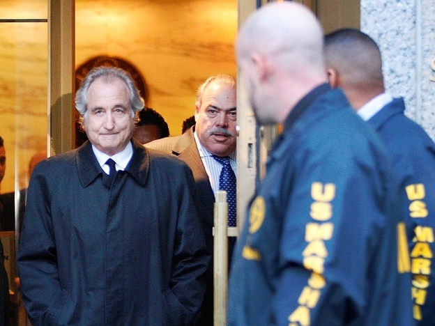 Bernie Madoff leaving U.S. District Court in Manhattan after a bail hearing in New York, Monday, Jan. 5, 2009. The former executive chairman of NASDAQ was sentenced to 150 years in prison in 2009 for his role in a massive Ponzi scheme.