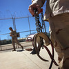 A U.S. military guard carries shackles in preparation for moving a detainee at the U.S. detention center in Guantanamo Bay, Cuba.