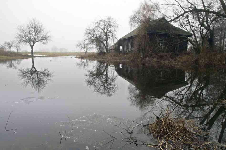 The April 26, 1986, accident at the Chernobyl nuclear power plant created ghost towns in Ukraine. Tens of thousands of people were evacuated from surrounding areas. Dozens of villages and properties remain empty, like this abandoned house, seen in 2006, in the deserted village of Redkova, about 22 miles from the plant. 