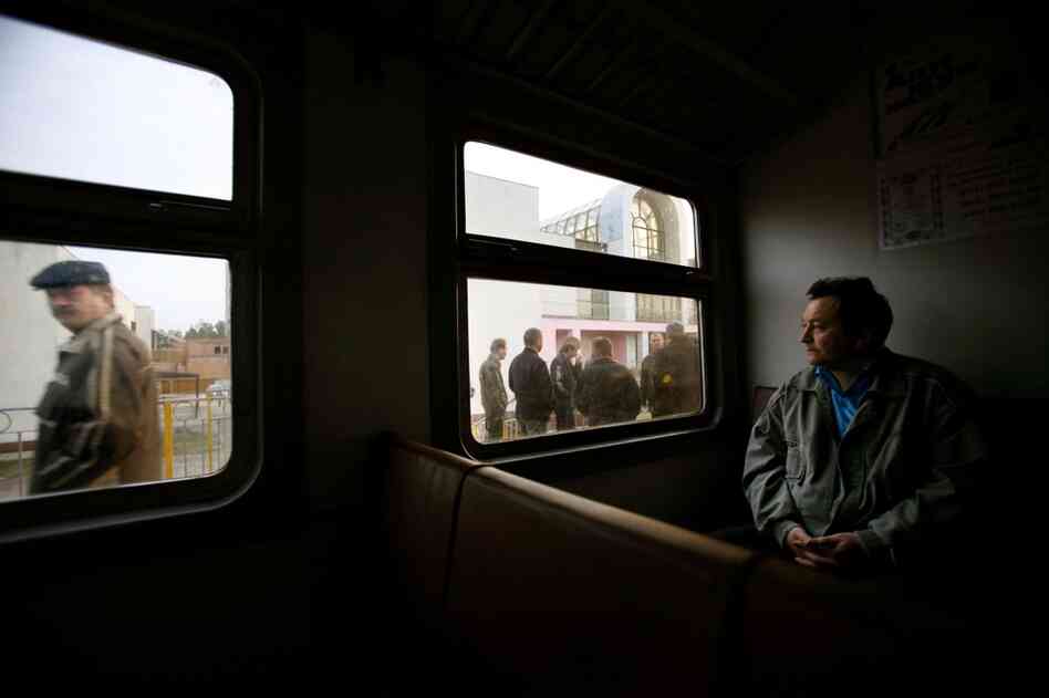 The Chernobyl power plant is still operational. Here, a worker waits on a train in Slavutich, Ukraine, on his way to the plant in 2006. After the 1986 accident, about 50,000 residents of the nearby city of Pripyat were evacuated. Slavutich, located about 37 miles from the plant, was built to house displaced workers and their families. 