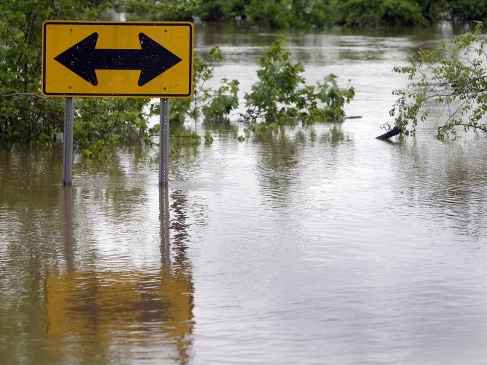 Floodwaters from the Black River surrounded a street sign earlier today (April 26, 2011) in Poplar Bluff, Mo.