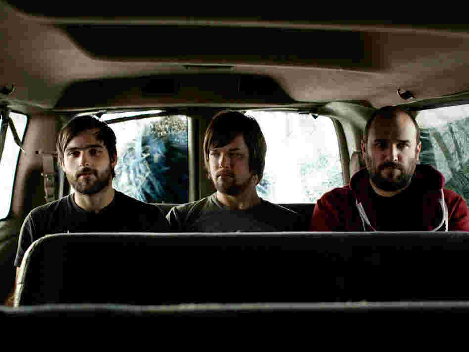 David Bazan (right), with bassist Andy Fitts (middle) and drummer Alex Westcoat (left).