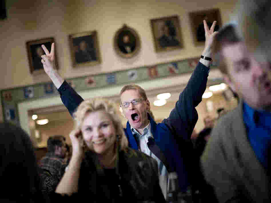 A supporter of Finland's nationalist party, True Finns, celebrates at the election headquarters after the parliamentary elections in Helsinki on April 17. True Finns blew away even the most optimistic predictions to suddenly become a major political force. A supporter of Finland's nationalist party, True Finns, celebrates at the election headquarters after the parliamentary elections in Helsinki on April 17. True Finns blew away even the most optimistic predictions to suddenly become a major political force.