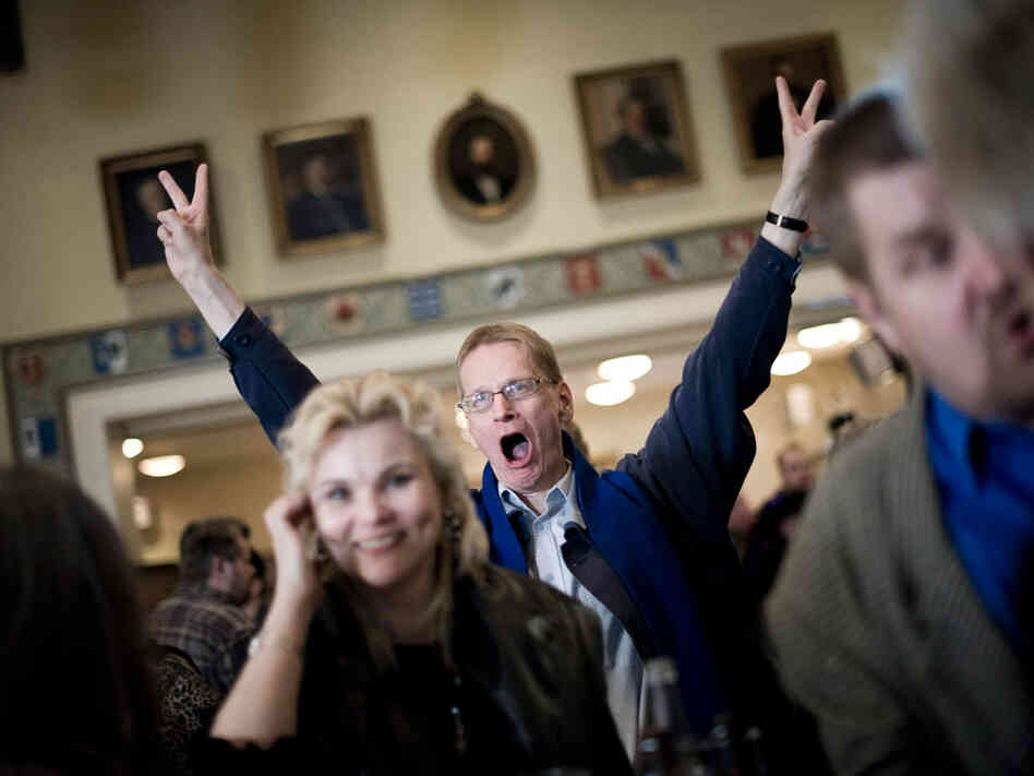 A supporter of Finland's nationalist party, True Finns, celebrates at the election headquarters after the parliamentary elections in Helsinki on April 17. True Finns blew away even the most optimistic predictions to suddenly become a major political force. A supporter of Finland's nationalist party, True Finns, celebrates at the election headquarters after the parliamentary elections in Helsinki on April 17. True Finns blew away even the most optimistic predictions to suddenly become a major political force.