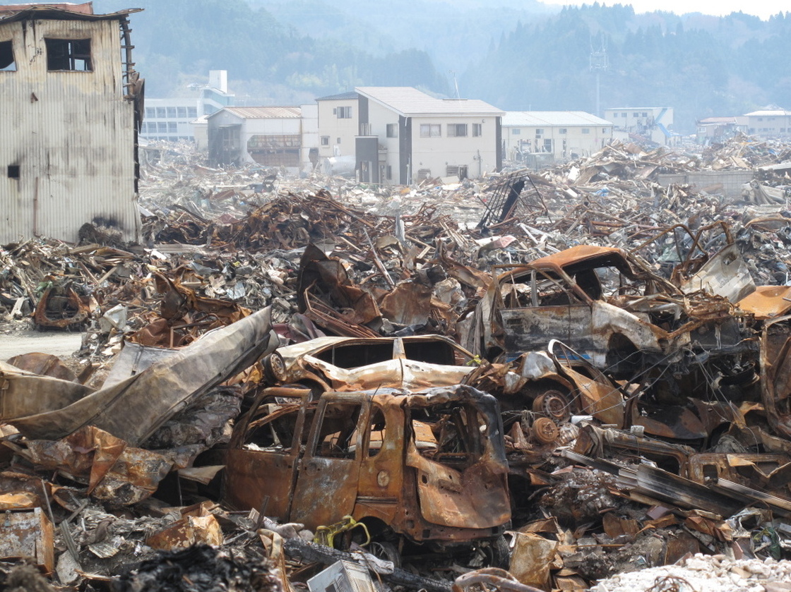 In Kesennuma, garbage covers much of the city, particularly in the harbor. Some baseball fields and parks nearby have been converted into areas where cranes can sort through the debris.