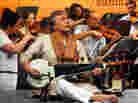 Amjad Ali Khan performs his concerto Samaagam with the Scottish Chamber Orchestra in Mumbai.