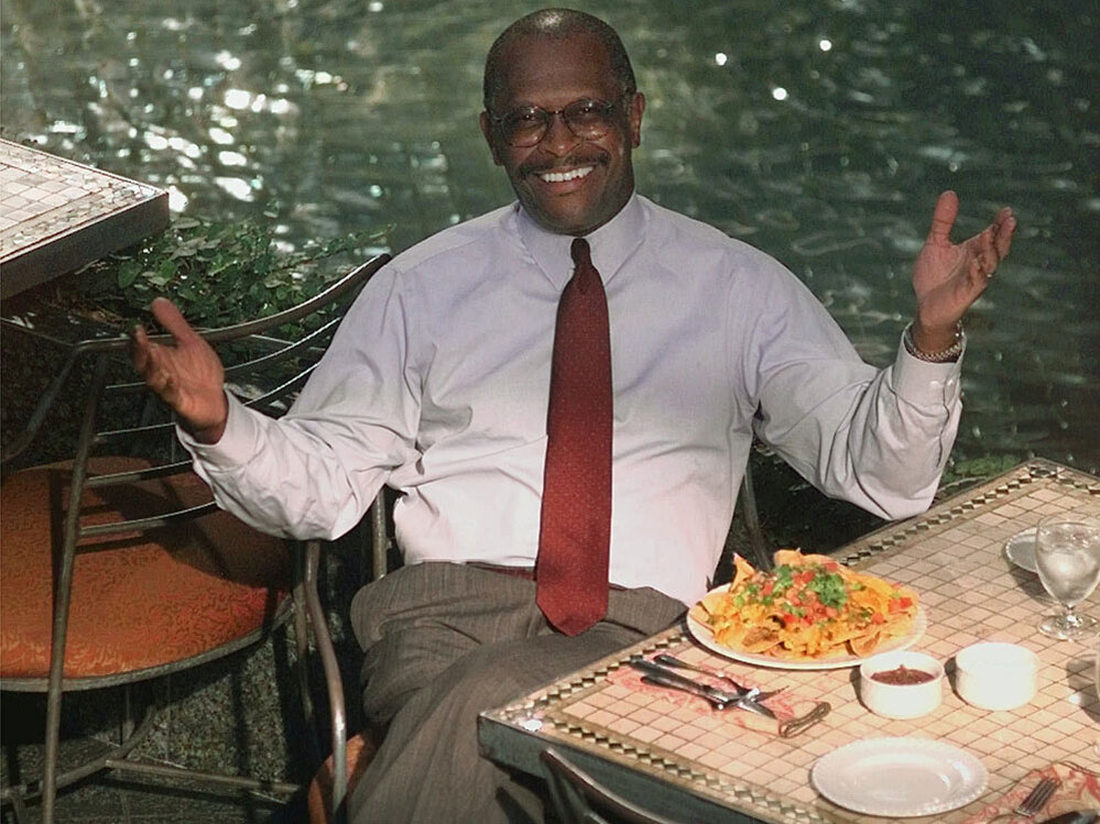 Cain, then-president of the National Restaurant Association, poses during an interview in Chicago in 1998.