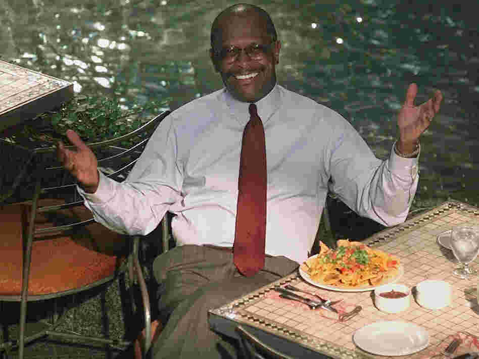 Cain, then-president of the National Restaurant Association, poses during an interview in Chicago in 1998.
