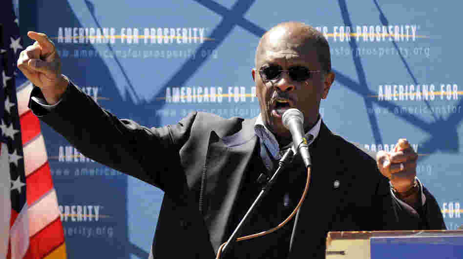 Herman Cain speaks at a Tea Party Tax Day rally this April outside the Statehouse in Concord, N.H. The former Atlanta talk show host and businessman is testing a possible presidential run. Herman Cain speaks at a Tea Party Tax Day rally this April outside the Statehouse in Concord, N.H. The former Atlanta talk show host and businessman is testing a possible presidential run.