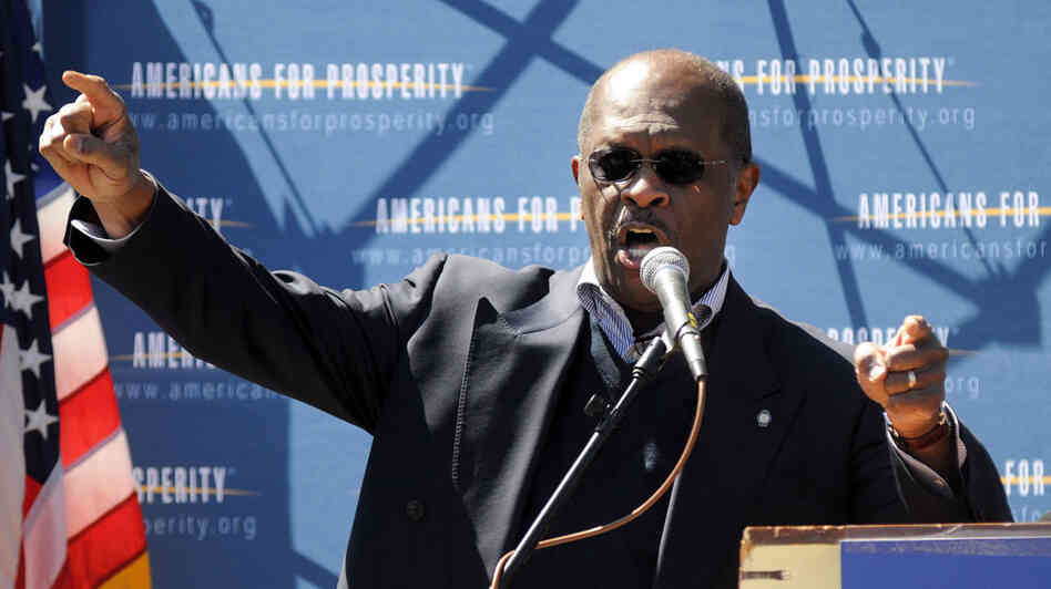 Herman Cain speaks at a Tea Party Tax Day rally this April outside the Statehouse in Concord, N.H. The former Atlanta talk show host and businessman is testing a possible presidential run. Herman Cain speaks at a Tea Party Tax Day rally this April outside the Statehouse in Concord, N.H. The former Atlanta talk show host and businessman is testing a possible presidential run.