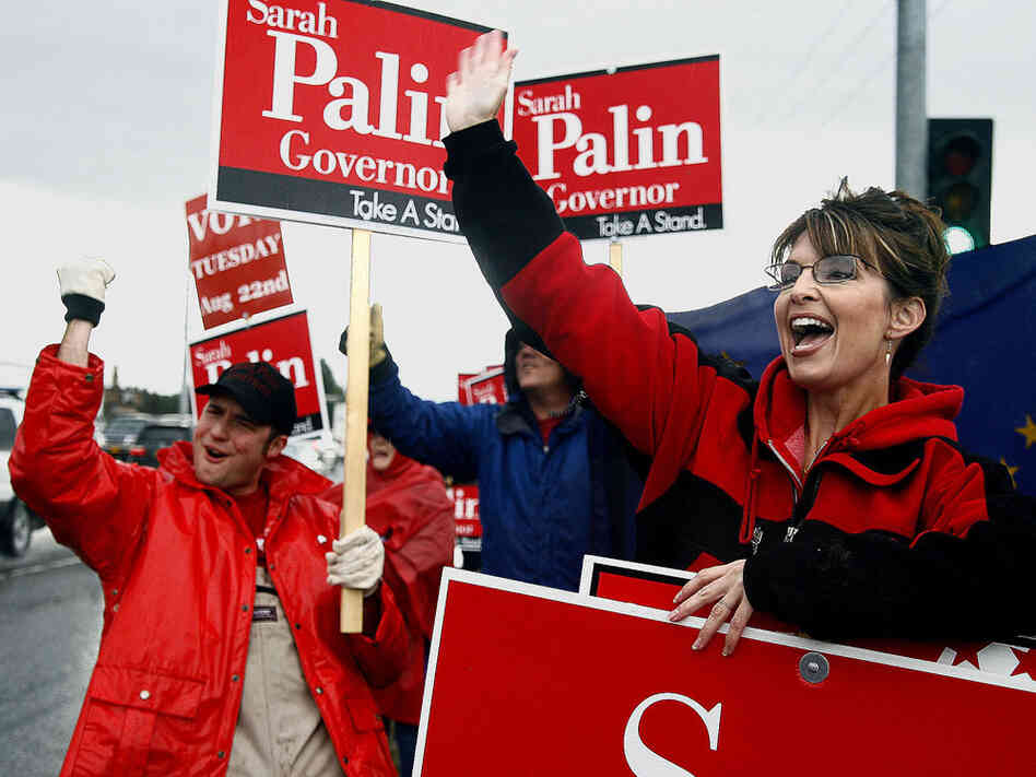 Sarah Palin stands in the rain in Anchorage, Alaska, with Robert Robl (left) and other supporters as she campaigns for the Republican gubernatorial nomination in the primary election Aug. 22, 2006. Sarah Palin stands in the rain in Anchorage, Alaska, with Robert Robl (left) and other supporters as she campaigns for the Republican gubernatorial nomination in the primary election Aug. 22, 2006.