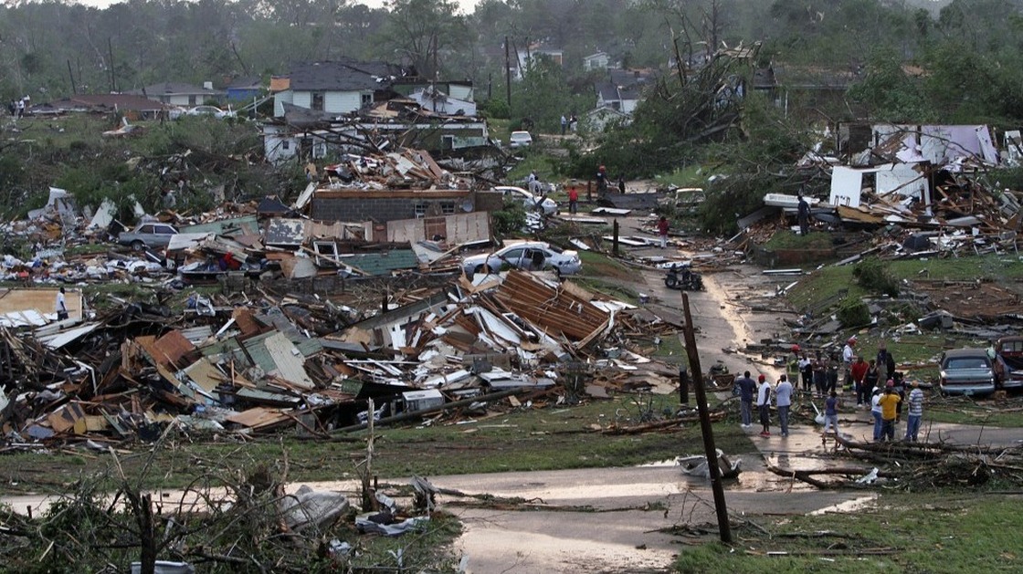 Residents survey wreckage in Pratt City, Ala. just north of downtown Birmingham, on Wednesday, April 27, 2011.