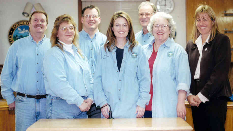 Sarah Palin (center) stands with the Wasilla, Alaska, City Council for a portrait in 1998. In 1992, then-Mayor John Stein recruited Palin as a moderate counterweight to the growing anti-government, anti-tax movement. By 1996, Palin challenged Stein in the race for mayor — and won. Sarah Palin (center) stands with the Wasilla, Alaska, City Council for a portrait in 1998. In 1992, then-Mayor John Stein recruited Palin as a moderate counterweight to the growing anti-government, anti-tax movement. By 1996, Palin challenged Stein in the race for mayor — and won.