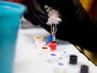 A tattoo artist prepares inks before working on a client. The FDA says it wants to learn more about what goes into tattoo inks. A tattoo artist prepares inks before working on a client. The FDA says it wants to learn more about what goes into tattoo inks.